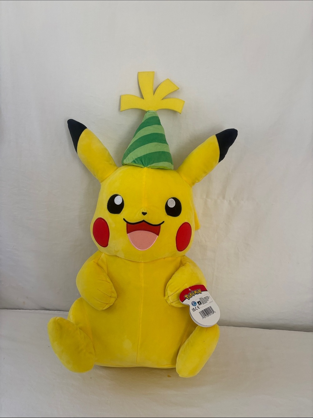 Game Stop Yellow Pikachu Plush with Green Party Hat. New with tags. Made 2011